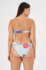 Profile view of model wearing the Oroton Picnic Print Bikini Bottom in Pale Blue and 78% polyamide, 22% elastane for Women