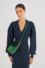 Profile view of model wearing the Oroton Florence Small Shoulder Bag in Treehouse and Smooth leather for Women