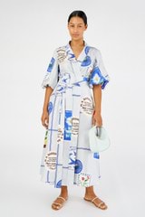 Profile view of model wearing the Oroton Picnic Print Dress in Pale Blue and 100% silk for Women