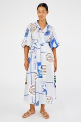 Profile view of model wearing the Oroton Picnic Print Dress in Pale Blue and 100% silk for Women