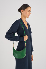 Profile view of model wearing the Oroton Florence Small Shoulder Bag in Treehouse and Smooth leather for Women