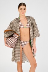 Profile view of model wearing the Oroton Gingham Print Kaftan in Chocolate and 100% cotton for Women