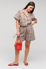 Profile view of model wearing the  Gingham Boxer Short in Chocolate and 100% Cotton for Men