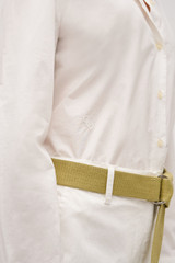 Profile view of model wearing the Oroton Wren Poplin Shirt in Antique White and Made from 100% poplin cotton  for Women
