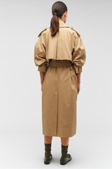 Profile view of model wearing the Oroton Trench in Dark Camel and 65% polyester, 35% cotton for Women