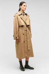 Profile view of model wearing the Oroton Trench in Dark Camel and 65% polyester, 35% cotton for Women
