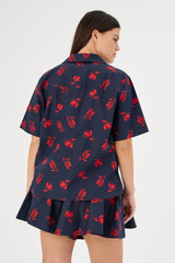 Profile view of model wearing the Oroton Dutch Tulip Print Camp Shirt in North Sea and 100% cotton for Women