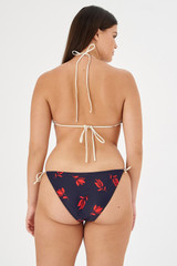 Profile view of model wearing the Oroton Dutch Tulip Bikini Bottom in North Sea and 78% polyamide, 22% elastane for Women