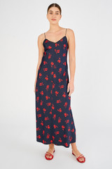 Profile view of model wearing the Oroton Dutch Tulip Slip Dress in North Sea and 100% silk for Women